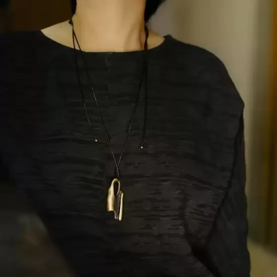 Abstract Curved Brass Pendant Necklace Abstract Curved Brass Pendant Necklace