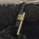 Ebony Wood & Brass Stick Pendant Necklace Ebony Wood & Brass Stick Pendant Necklace
