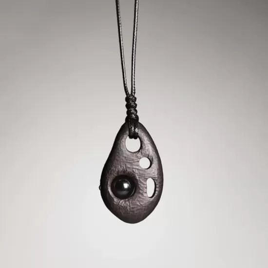 Perforated Ebony Wood & Obsidian Pendant Necklace Perforated Ebony Wood & Obsidian Pendant Necklace