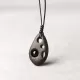 Perforated Ebony Wood & Obsidian Pendant Necklace Perforated Ebony Wood & Obsidian Pendant Necklace