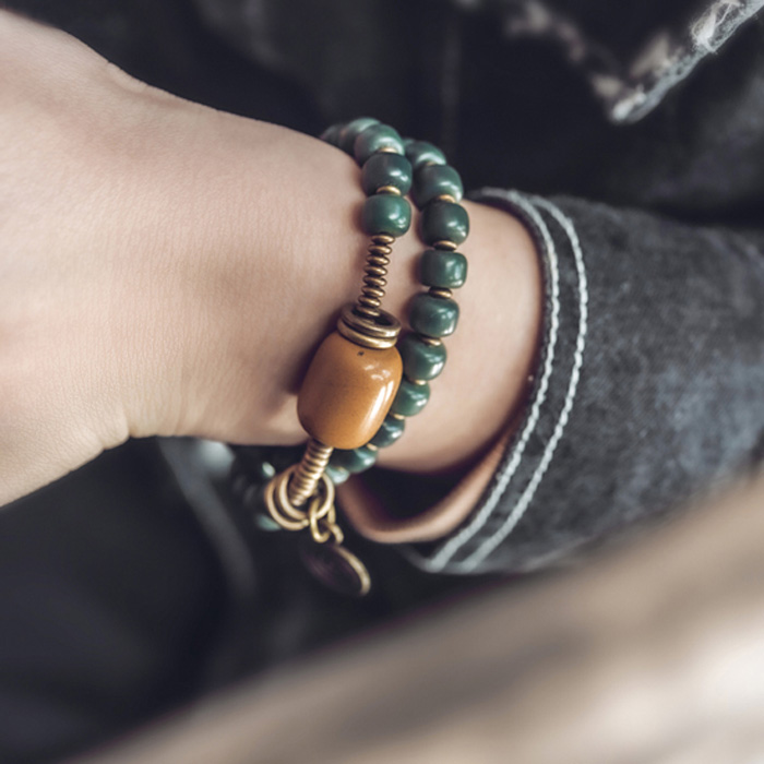 Handcrafted men's beaded bracelet presented as a gift option