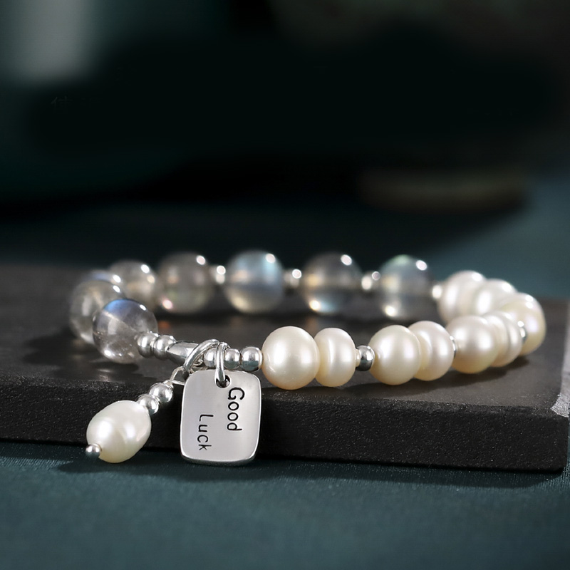 Freshwater pearl and silver bracelet showing natural pearl shape and luster
