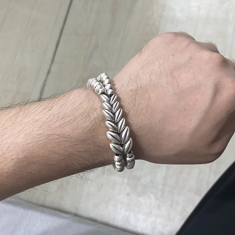 Bracelet photographed on the wrist to illustrate fit and wearing position